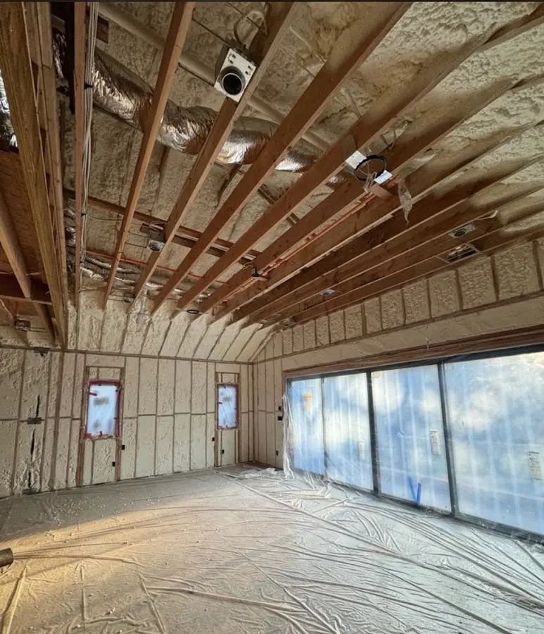 Interior walls and ceiling insulated with spray foam during new construction in Pearland